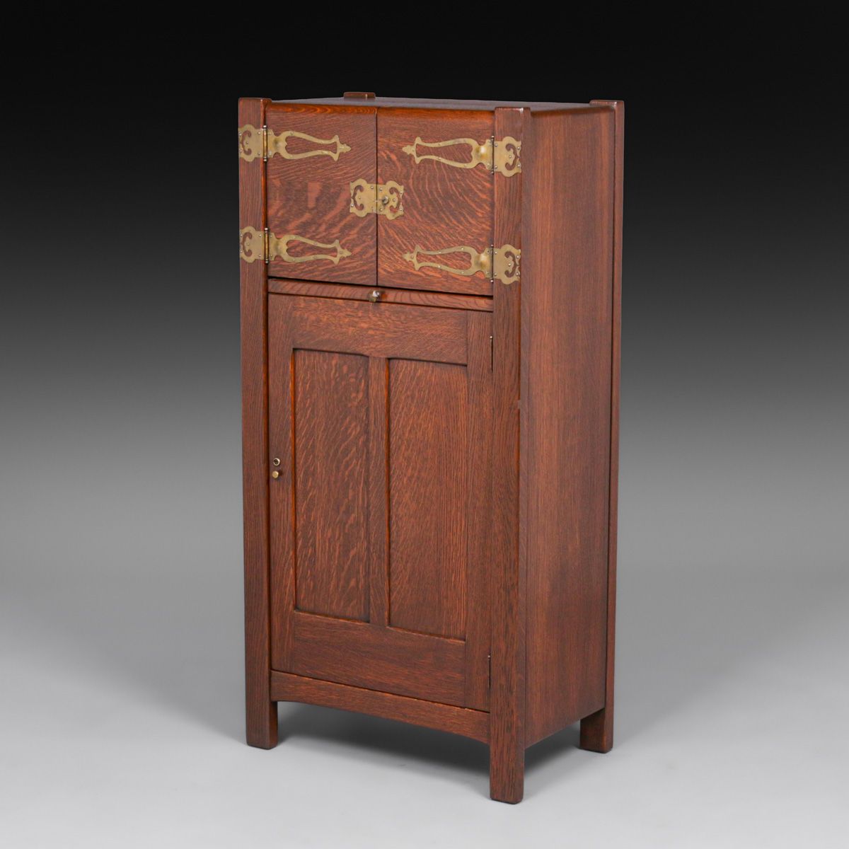 Grand Rapids Oak & Cutout Brass Cellarette c1910