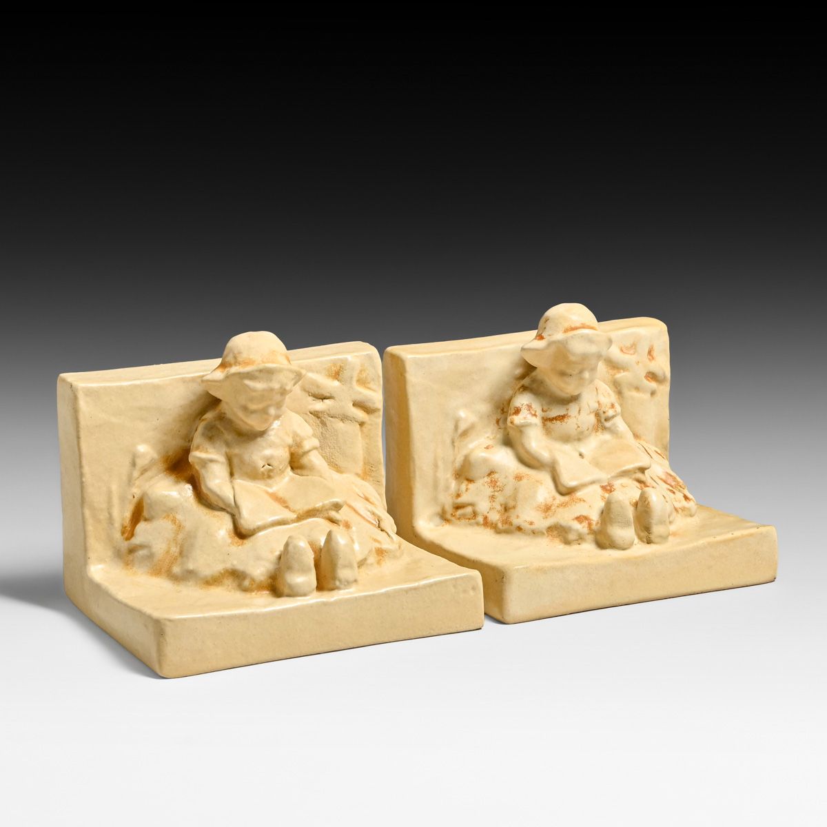 Teco Pottery Pair Children Reading Figural Bookends c1910